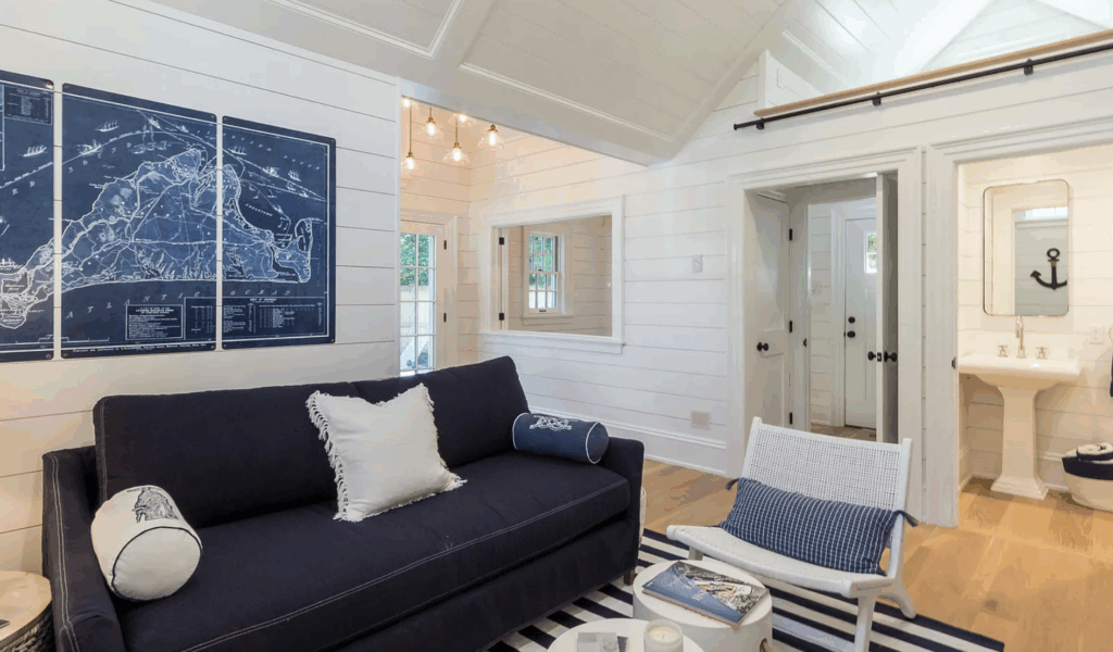 A coastal guest house featuring white and navy blue decor